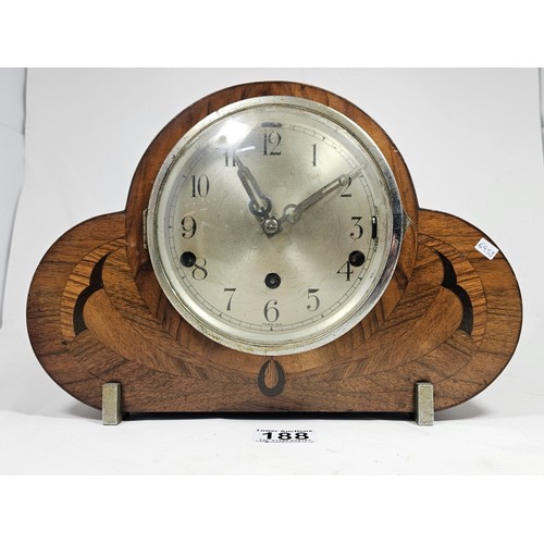 188 - An ornate Art Deco club shaped mantel clock with Whittington and Westminster chimes, appears to be i... 