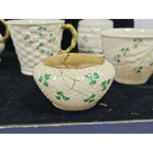 190 - A collection of 7 pieces of Belleek items, to include 3 cups with the iconic clover leaf design and ... 