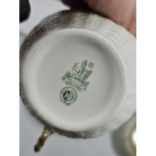 190 - A collection of 7 pieces of Belleek items, to include 3 cups with the iconic clover leaf design and ... 