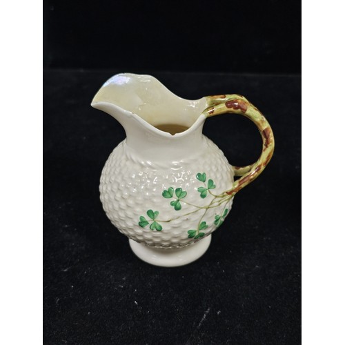 190 - A collection of 7 pieces of Belleek items, to include 3 cups with the iconic clover leaf design and ... 