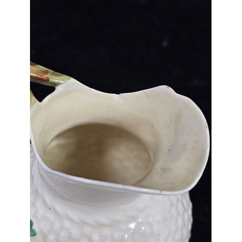 190 - A collection of 7 pieces of Belleek items, to include 3 cups with the iconic clover leaf design and ... 
