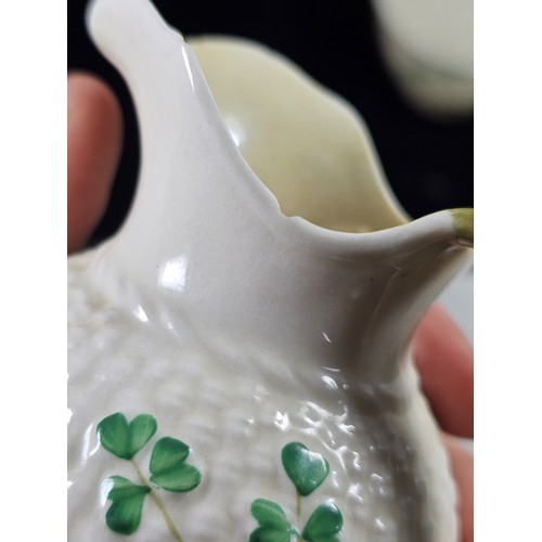190 - A collection of 7 pieces of Belleek items, to include 3 cups with the iconic clover leaf design and ... 