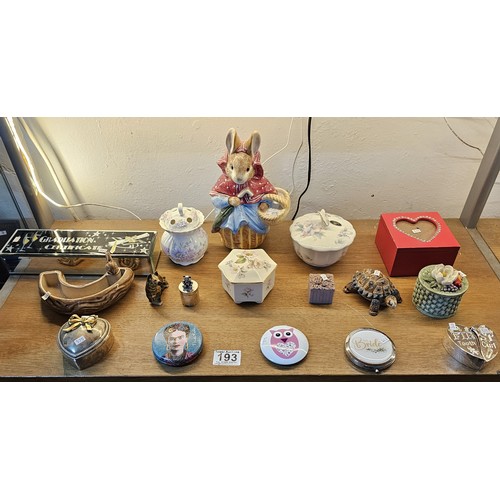 193 - A collection of collectable trinket boxes of varying makes and designs to include a wade trinket box... 
