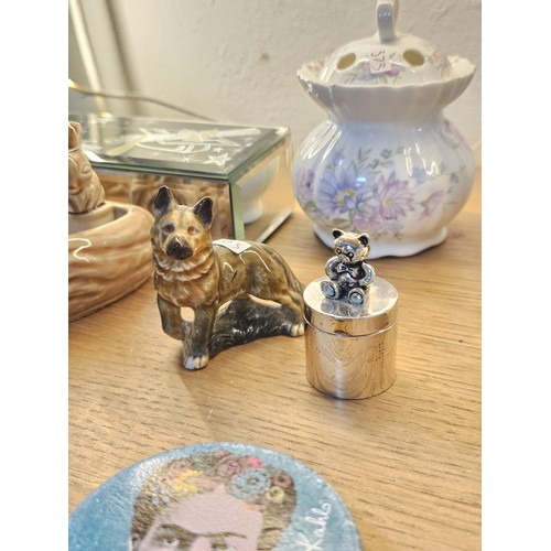 193 - A collection of collectable trinket boxes of varying makes and designs to include a wade trinket box... 