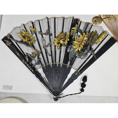 194 - A collection of 4x good quality oriental fans to include a black lace fan with hand stitched floral ... 
