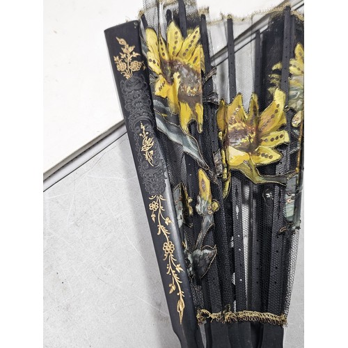 194 - A collection of 4x good quality oriental fans to include a black lace fan with hand stitched floral ... 