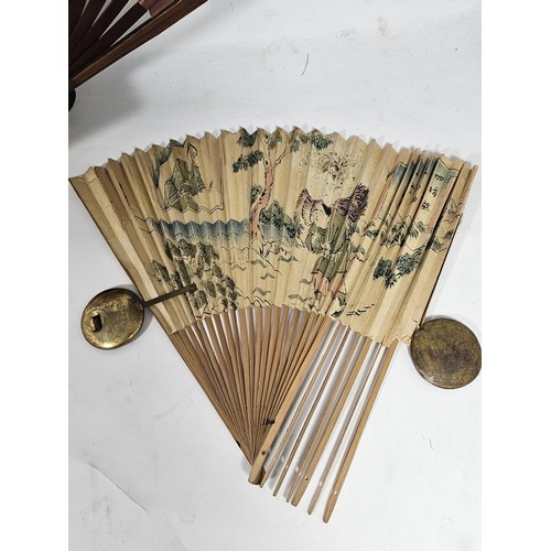 194 - A collection of 4x good quality oriental fans to include a black lace fan with hand stitched floral ... 