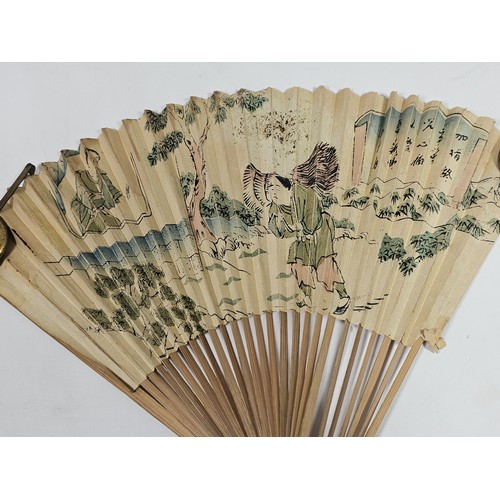 194 - A collection of 4x good quality oriental fans to include a black lace fan with hand stitched floral ... 