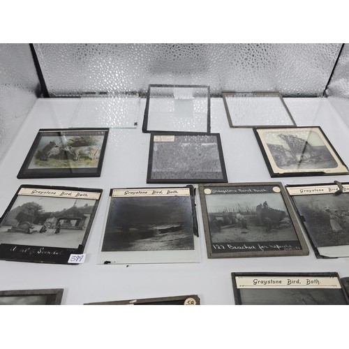 213 - A desirable collection of rare antique magic lantern glass slides from the late 19th century,c compr... 