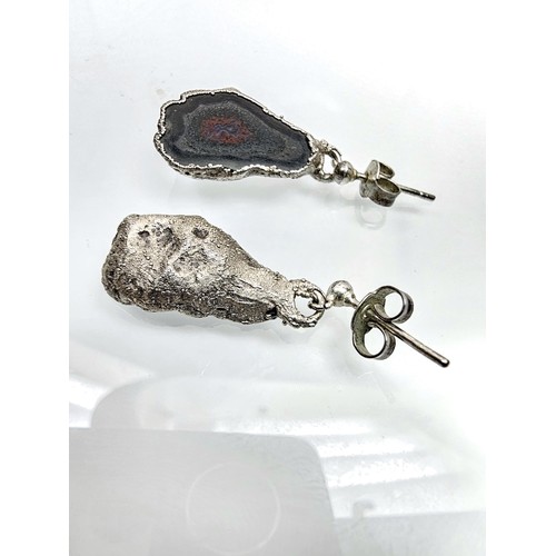 234 - An unusual attractive pair of 925 silver drop earrings featuring real geode crystal agate slice drop... 