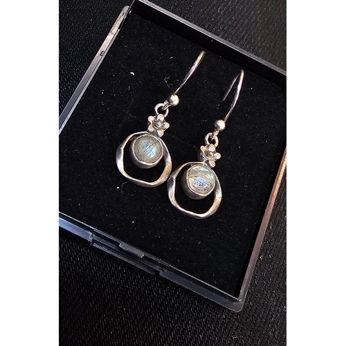 235 - A pair of pretty vintage 925 silver drop earrings, having a flower design set with rainbow moonstone... 