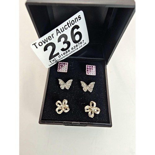 236 - 3 pairs of 925 silver stud earrings, to include  a very pretty pair of butterfat formed earrings set... 