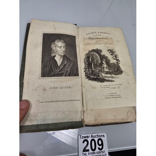 209 - An antique 19th century copy of the Conduct of the Understanding by John Locke, bound together with ... 