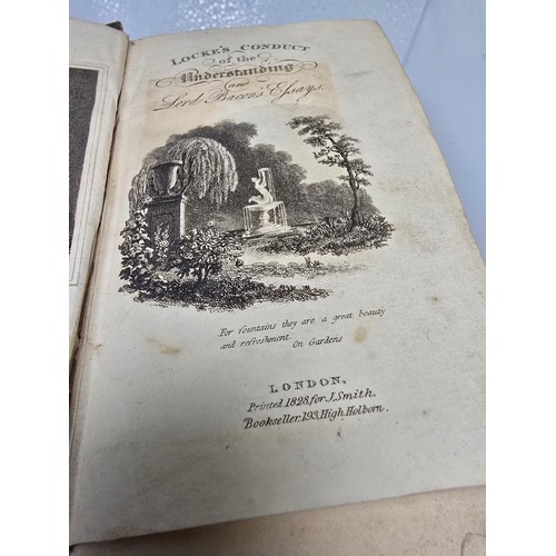 209 - An antique 19th century copy of the Conduct of the Understanding by John Locke, bound together with ... 