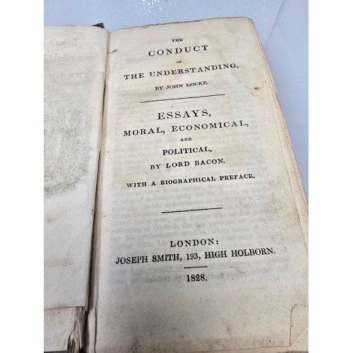 209 - An antique 19th century copy of the Conduct of the Understanding by John Locke, bound together with ... 