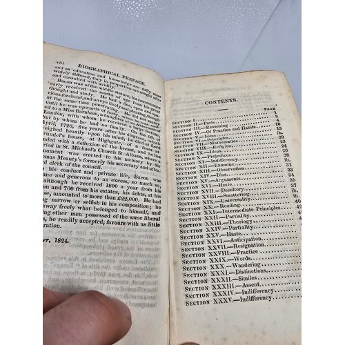 209 - An antique 19th century copy of the Conduct of the Understanding by John Locke, bound together with ... 