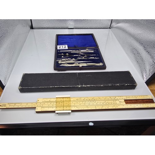 212 - A good quality vintage complete and cased technical drawing set, along with a vintage boxed unique e... 