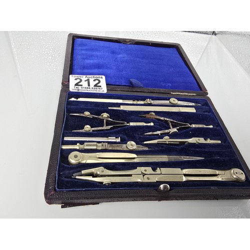 212 - A good quality vintage complete and cased technical drawing set, along with a vintage boxed unique e... 