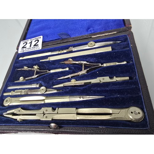 212 - A good quality vintage complete and cased technical drawing set, along with a vintage boxed unique e... 