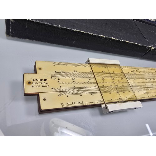 212 - A good quality vintage complete and cased technical drawing set, along with a vintage boxed unique e... 