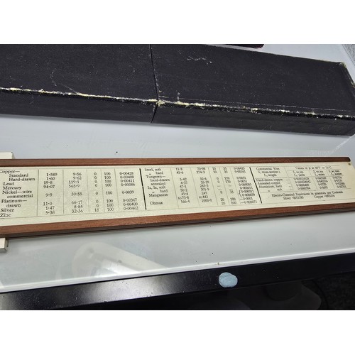 212 - A good quality vintage complete and cased technical drawing set, along with a vintage boxed unique e... 