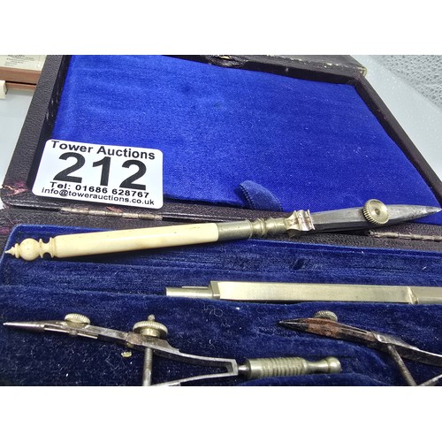 212 - A good quality vintage complete and cased technical drawing set, along with a vintage boxed unique e... 