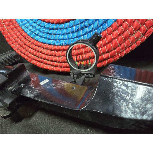 A compound archery bow and accessories, the black composite-limbed bow ...