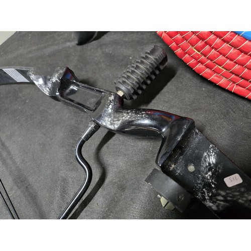 A compound archery bow and accessories, the black composite-limbed bow ...