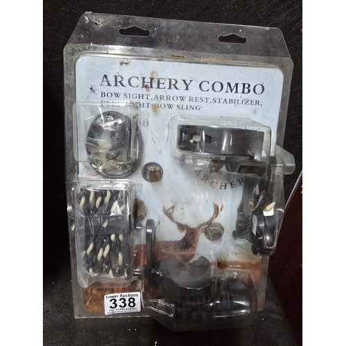 A compound archery bow and accessories, the black composite-limbed bow ...
