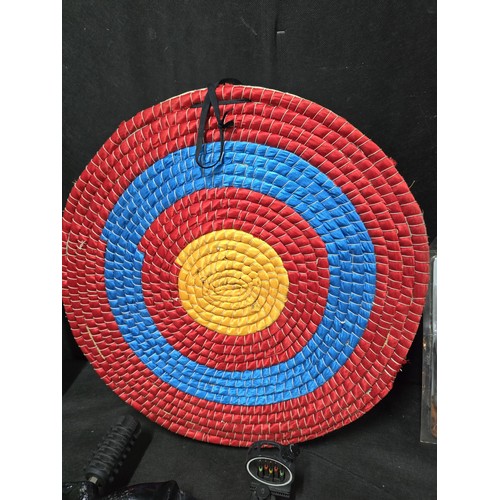 A compound archery bow and accessories, the black composite-limbed bow ...