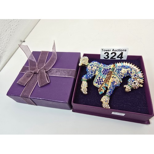 A large and impressive as new costume brooch in the form of a horse ...