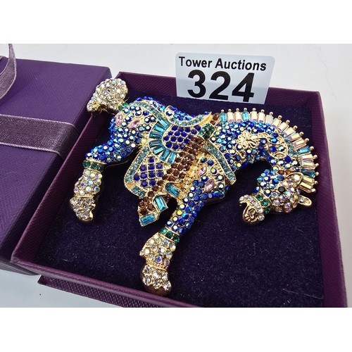 A large and impressive as new costume brooch in the form of a horse ...