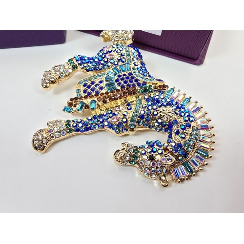A large and impressive as new costume brooch in the form of a horse ...