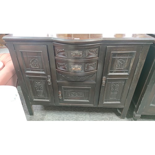An early twentieth-century sideboard with a projecting bow-front centre ...