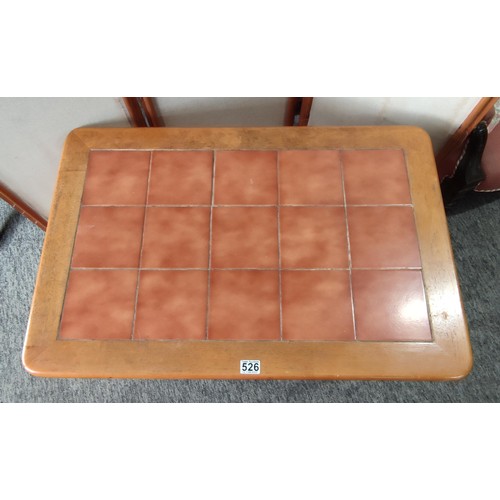 A wooden breakfast table with a rectangular top inset with twelve ...