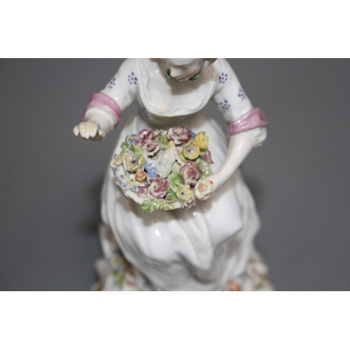 101 - A Chelsea figure of a lady holding a flower basket, c.1765, H. 17.5cm Condition: unmarked, restorati... 