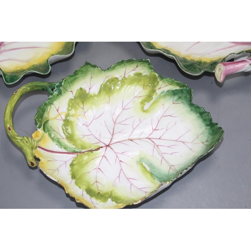 105 - Three Chelsea red anchor 'leaf' dishes, c.1755, 24 and 23.5cm long Condition: The two larger leaf di... 