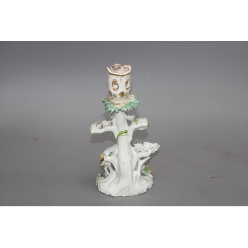 106 - An early Derby figural 'sheep and tree' candlestick, c.1758, 21.5cm Condition: With losses to the fl... 