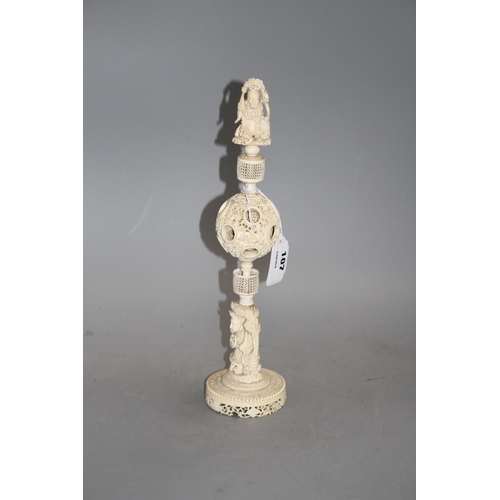 107 - A 19th century Chinese carved ivory concentric ball on stand, height 35cm Condition: Hairline crack ... 