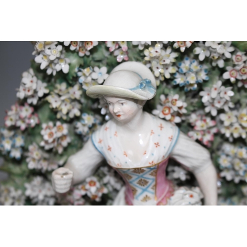 111 - Two large Derby bocage figures, c.1775, 26.5 and 28.5cm Condition: Both with typical small losses to... 