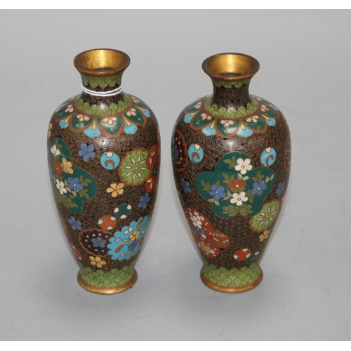 12 - A pair of Japanese cloisonne vases, height 15cm Condition: Minor firing spots and wear to the gildin... 