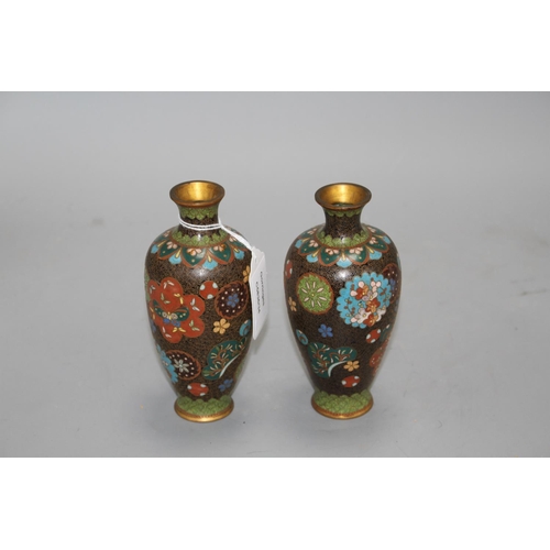 12 - A pair of Japanese cloisonne vases, height 15cm Condition: Minor firing spots and wear to the gildin... 