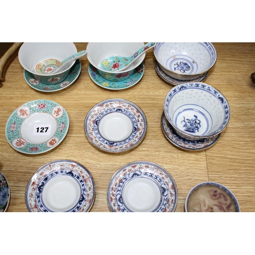 127 - Six Chinese porcelain bowls, eight stands, three spoons and a candle holder, second half 20th centur... 