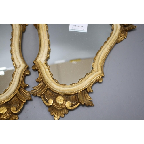 128 - A pair of Italian giltwood cartouche shaped wall mirrors, width 25cm, height 43cm Condition: Some mi... 