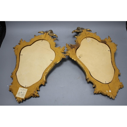 128 - A pair of Italian giltwood cartouche shaped wall mirrors, width 25cm, height 43cm Condition: Some mi... 