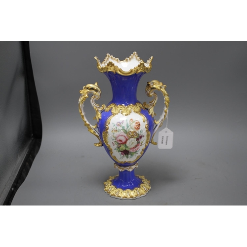 129 - A Victorian porcelain vase, painted with panels of garden flowers, height 35cm Condition: Minor firi... 