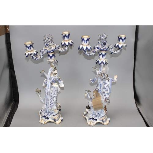 150 - A pair of Meissen porcelain candelabra, modelled with lady and gallant stems, height 46cm Condition:... 