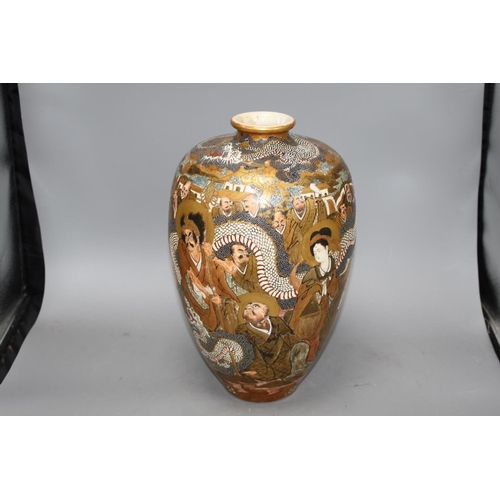 158 - A Japanese Satsuma vase, decorated with a dragon and immortals, signed to the base, height 36cm Cond... 