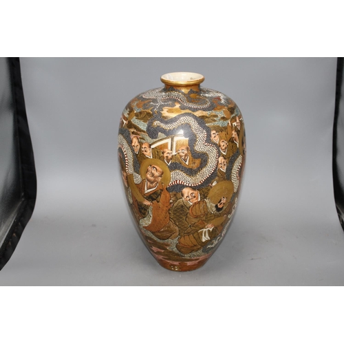 158 - A Japanese Satsuma vase, decorated with a dragon and immortals, signed to the base, height 36cm Cond... 