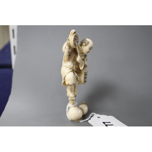 177 - A Japanese carved ivory figure of an entertainer startled by a rat, late Meiji period, signed, heigh... 